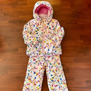 Obermeyer snowsuit, size 3T. “Livia” jacket, “Snoverall”bibs.